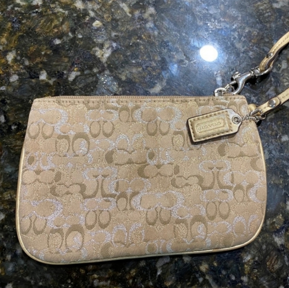 Coach Wrislet - Tan/Cream with sparkles and light purple inside.